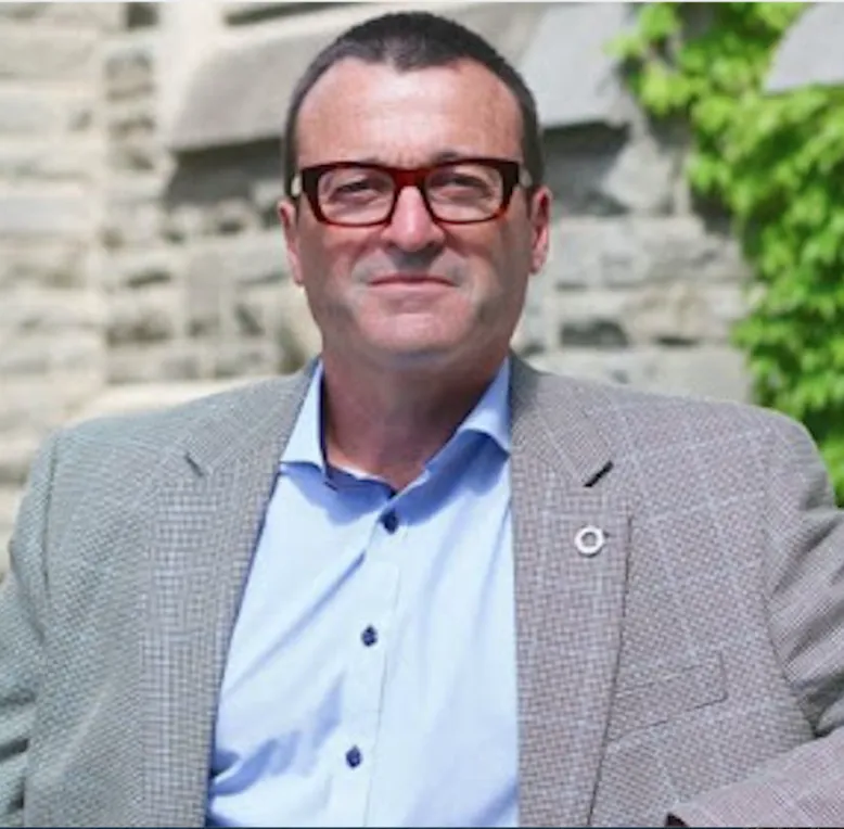 Prof. Charles E Weijer