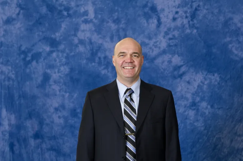 Dr. Gerard D Wright