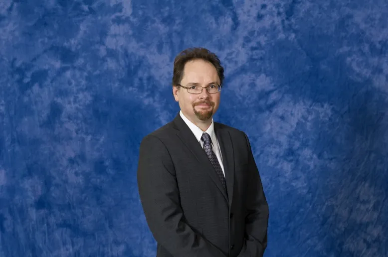 Dr. Andrew Roger